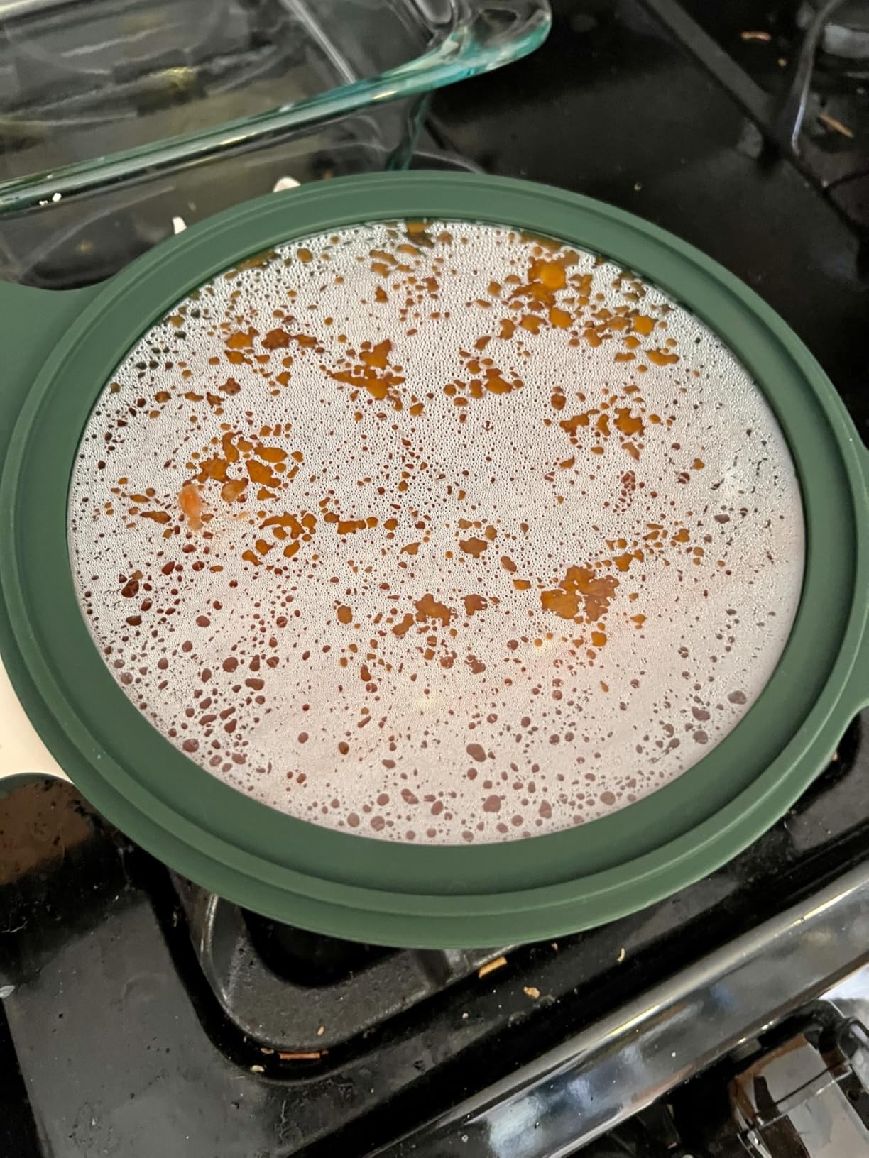 Customer photo showing the complete Alva Neat cookware set stacked together