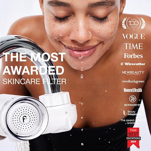 Filterbaby Skincare Filter 2.0 mounted on a bathroom faucet during face washing
