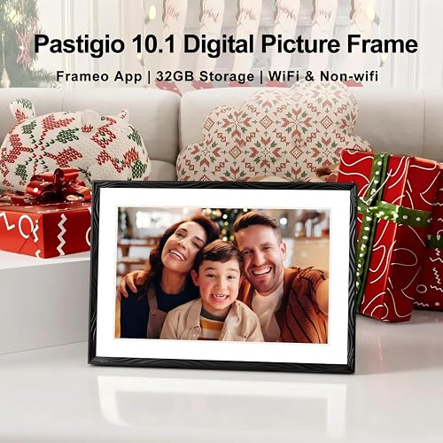Frameo 10.1 inch digital picture frame in a black engraved frame displaying a family photo on a shelf