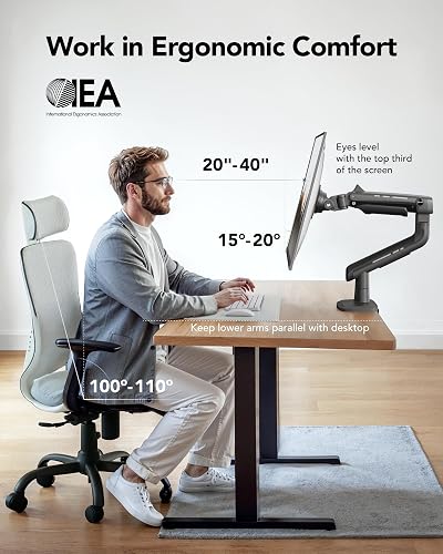 HUANUO TitanLift heavy duty monitor arm shown mounted on a desk holding an ultrawide screen