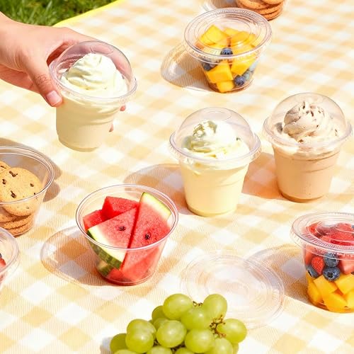 Lamosi 9 oz cups shown at a picnic holding fruit, whipped desserts, and ice cream portions
