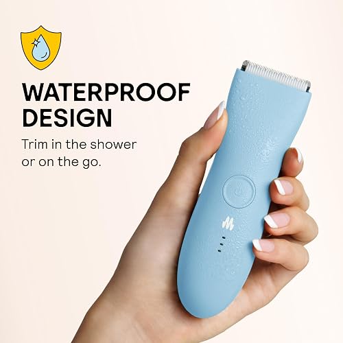 Meridian The Trimmer Original being held, highlighting its 100% waterproof design for shower use