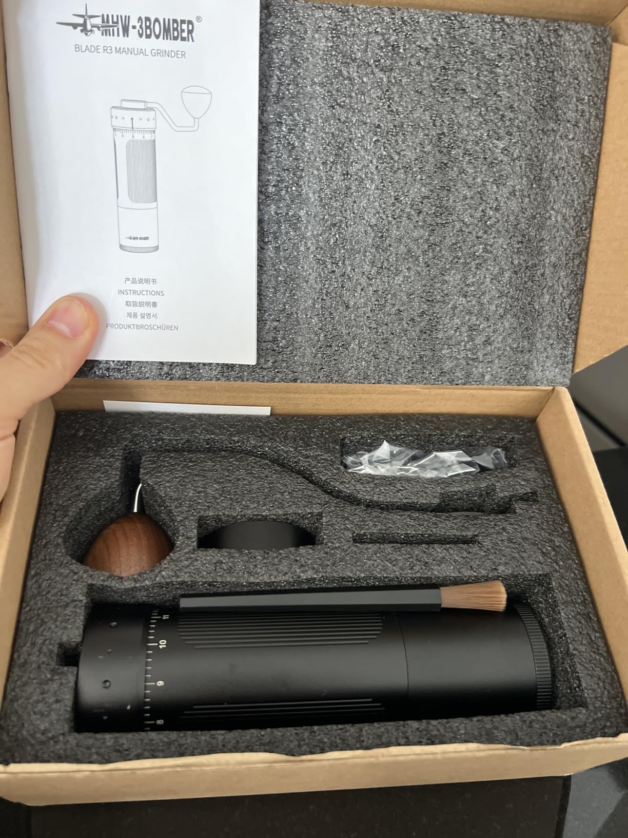 MHW-3BOMBER R3 magnetic catch cup and sieves laid out on a counter
