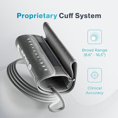 Oxiline Pressure XS Pro upper arm cuff coiled with its hose, showing the index range marking