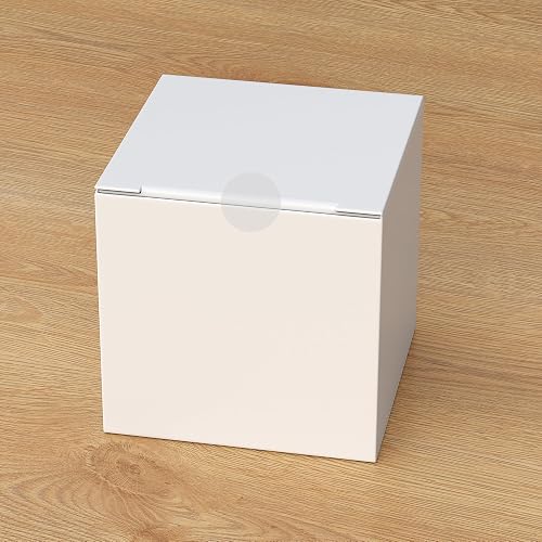 A PARLAIM clear dot sealing the lid of a white gift box, nearly invisible against the cardboard