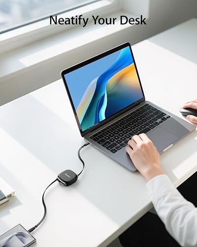 SooPii retractable USB-C cable shown charging a laptop from a compact charger