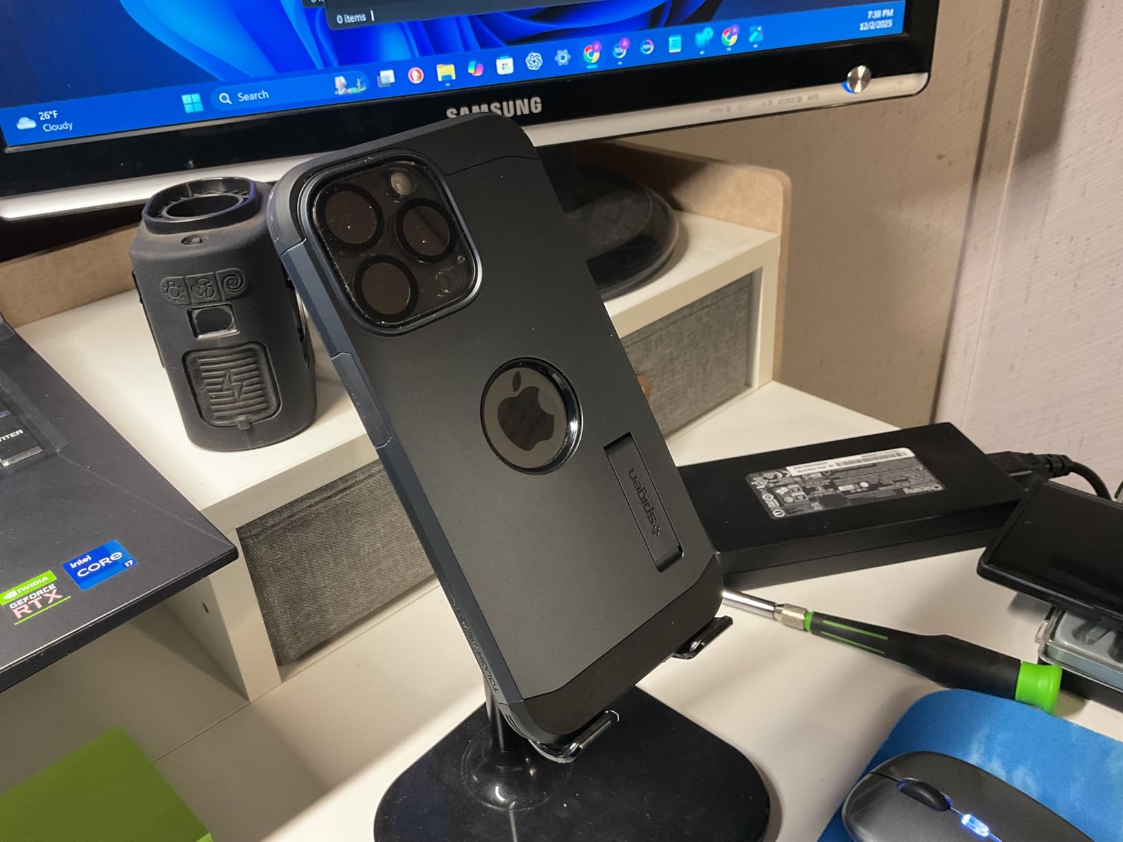 Customer photo showing Spigen Tough Armor protection features