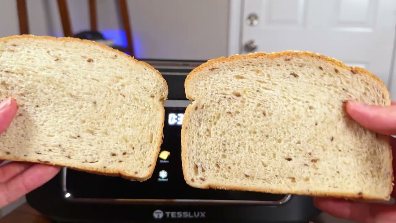 Tesslux 4 Slice Touch Screen Toaster on the kitchen counter with the touchscreen lit up