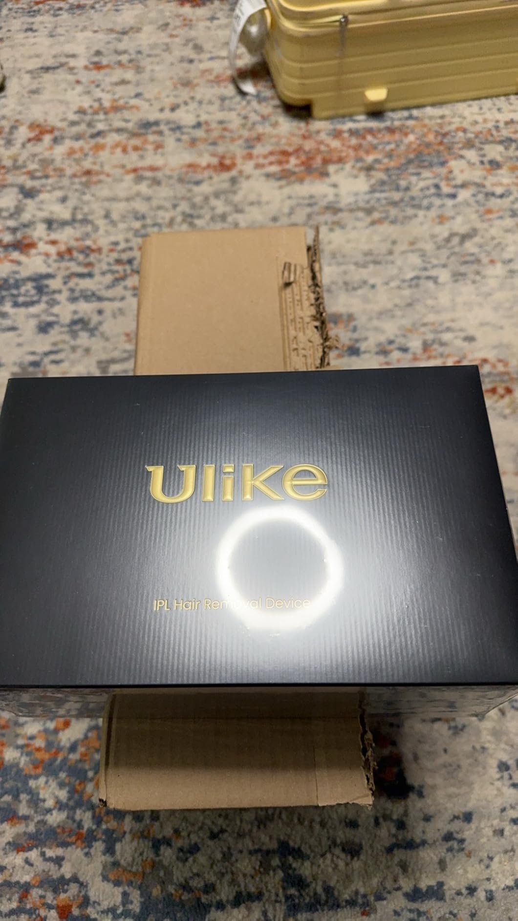 Customer photo showing Ulike X IPL hair removal device with included accessories